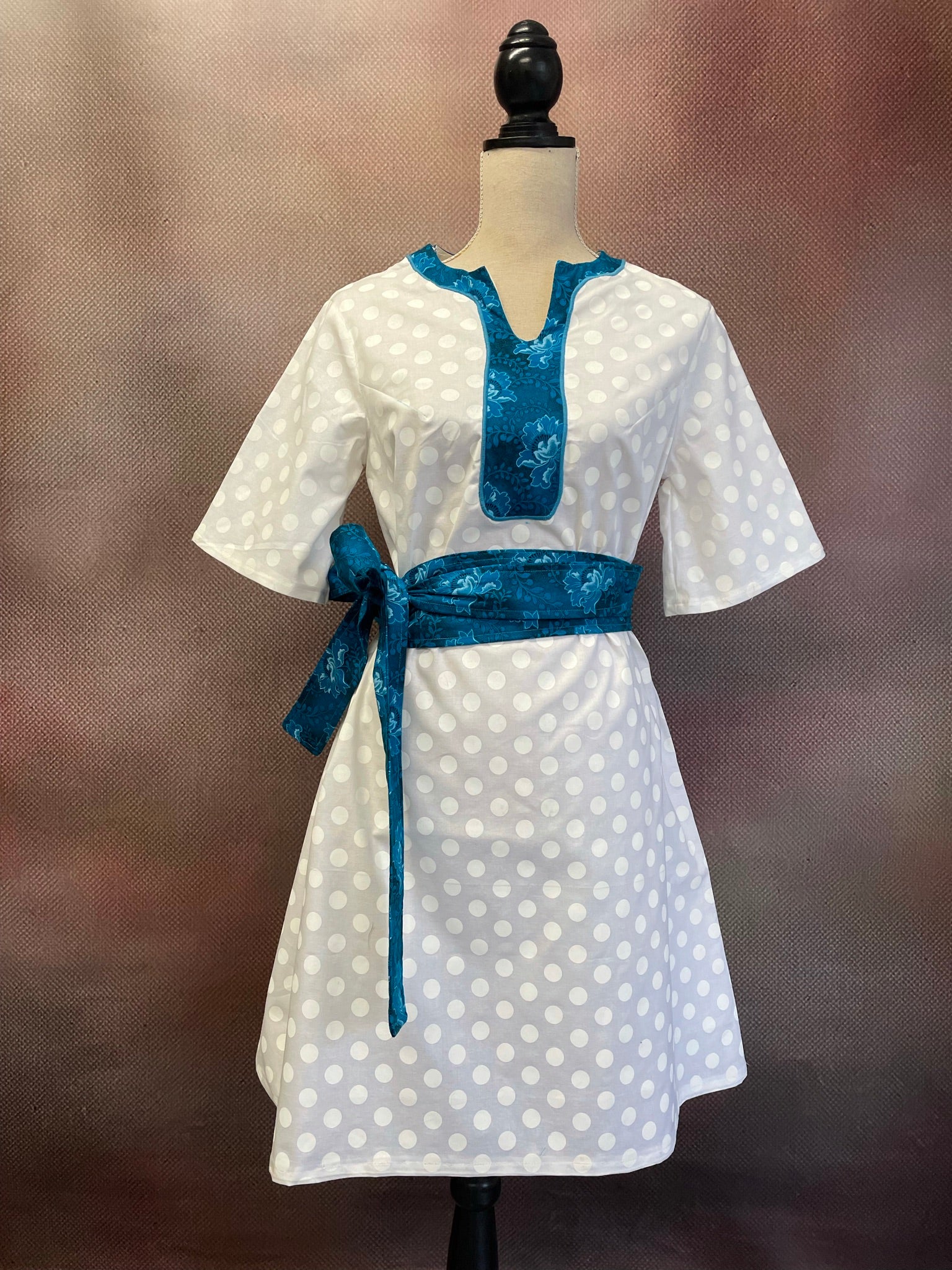 V-Neck dot dress with floral trim
