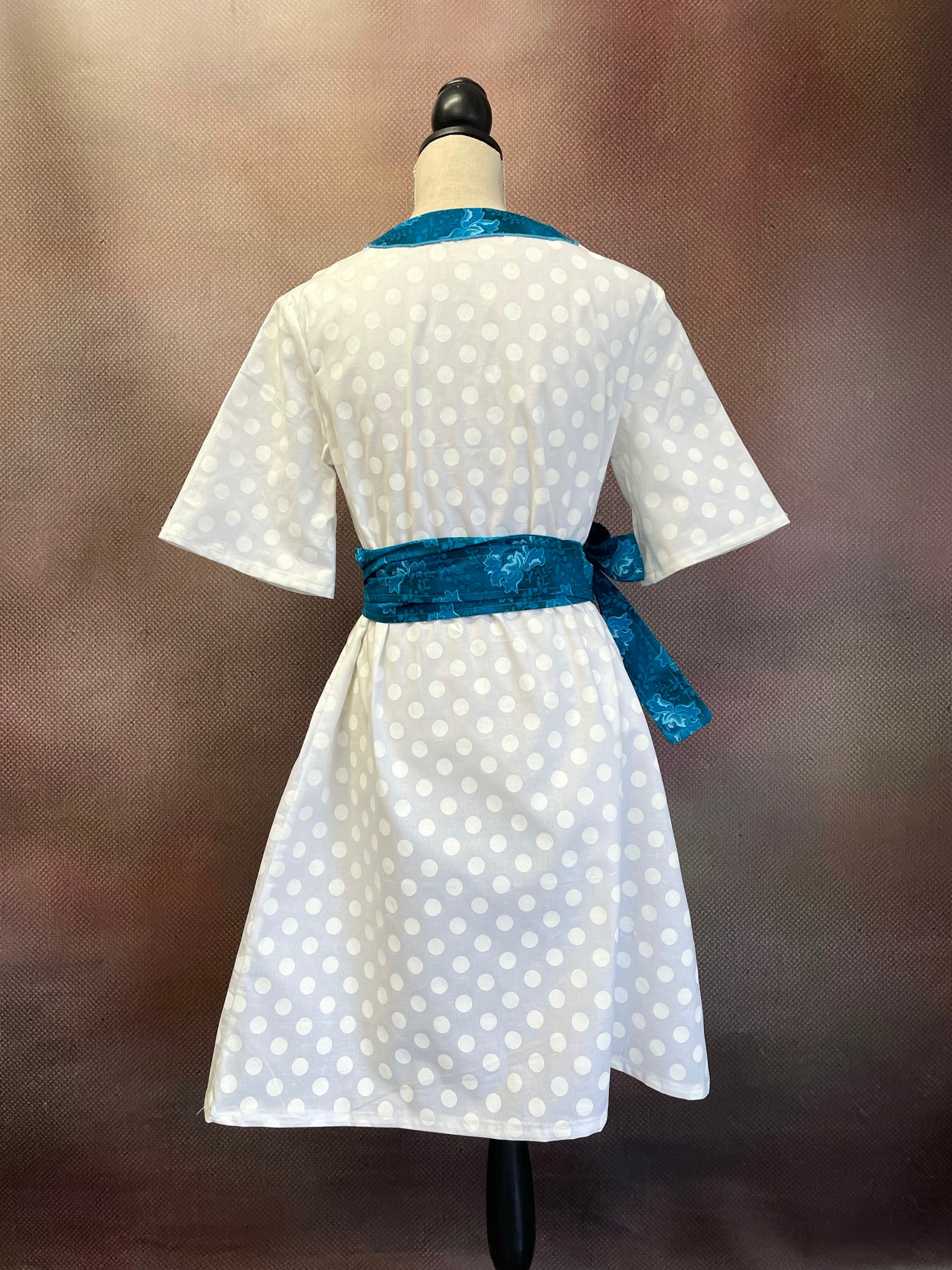 V-Neck dot dress with floral trim